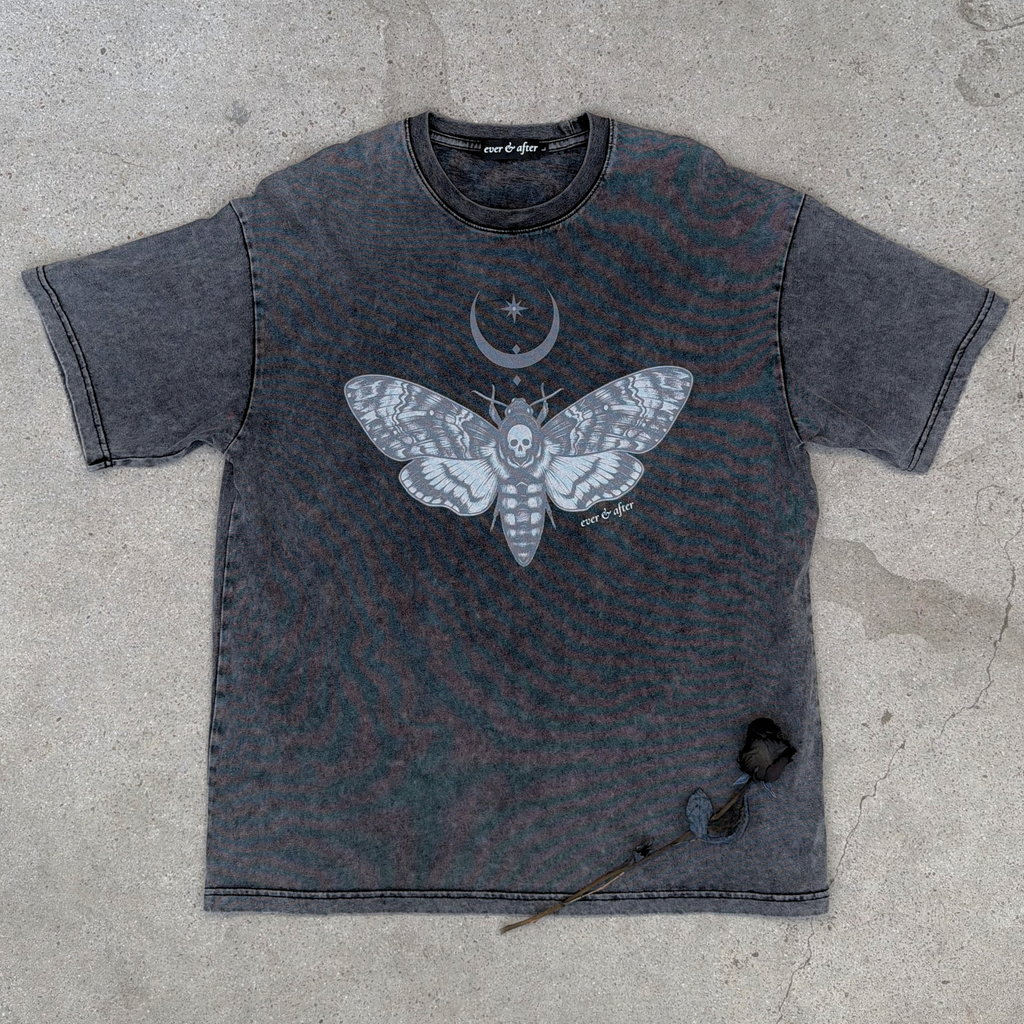 gothic stone oversized tee layflat on concrete with rose