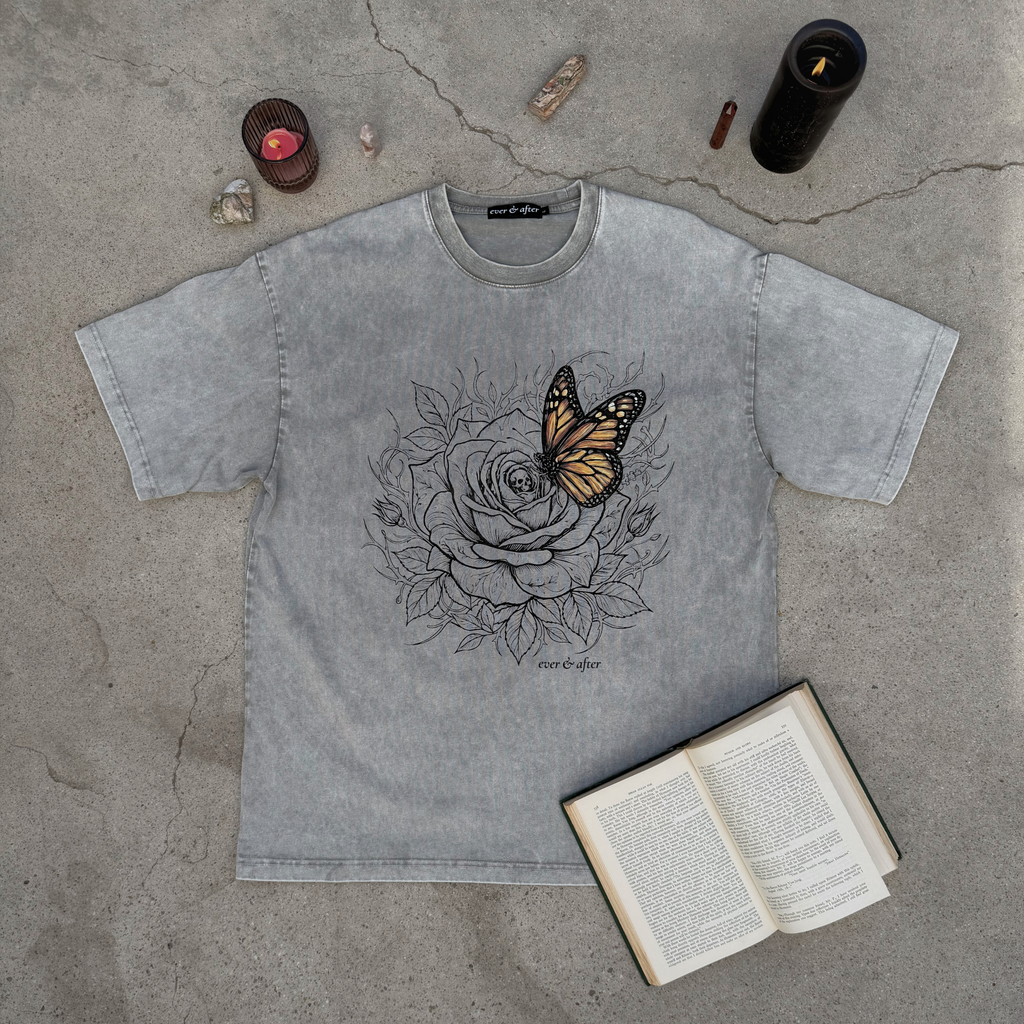 flaylat of light gray tee with rose and butterfly graphic design