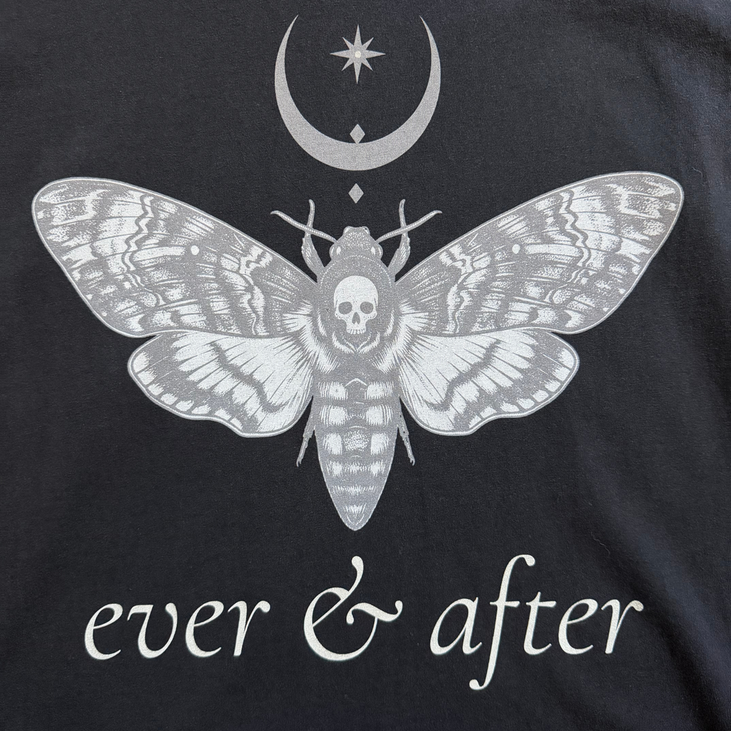Black t-shirt with white moth design and 'ever & after' text on a black background