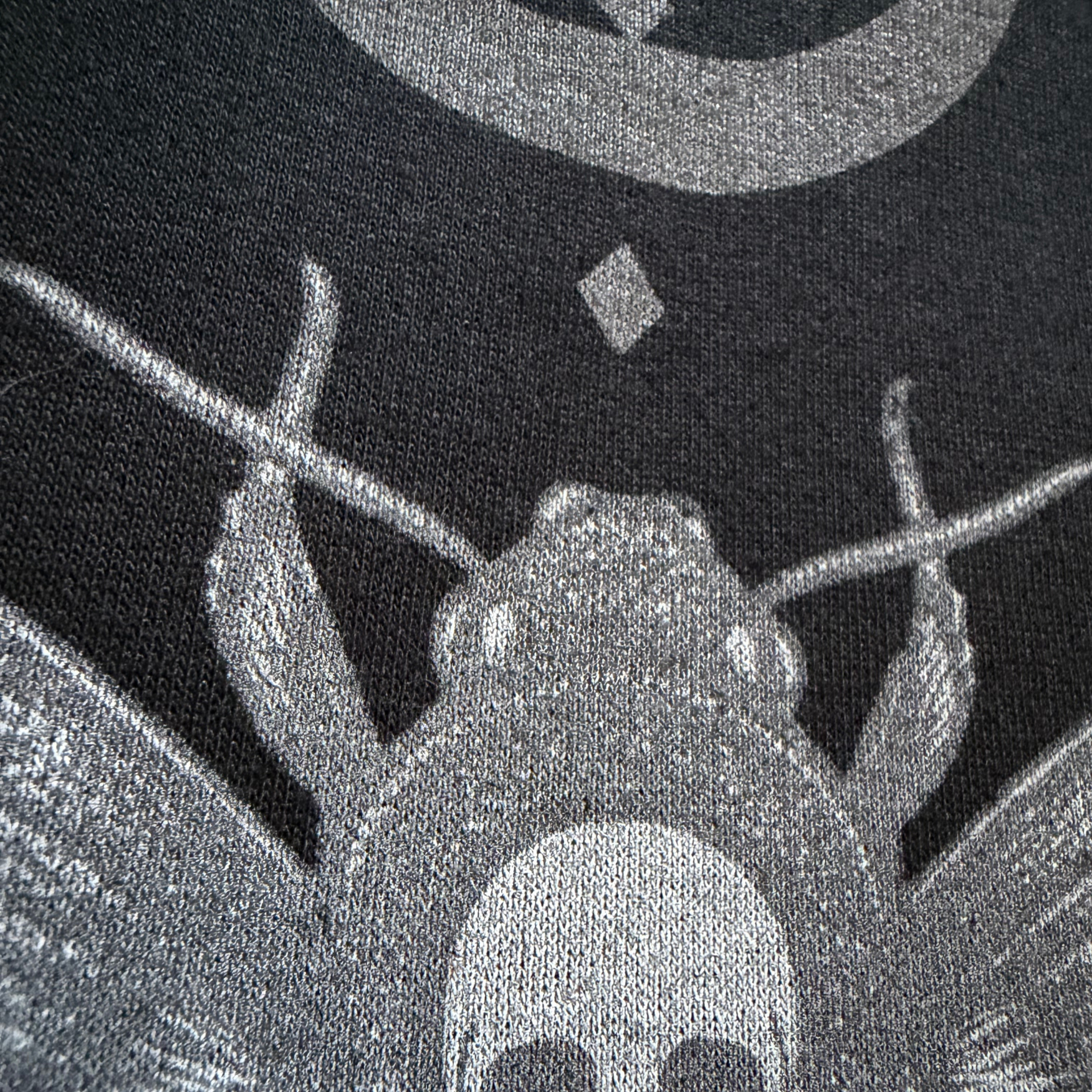 Close-up of a beetle design on a black background